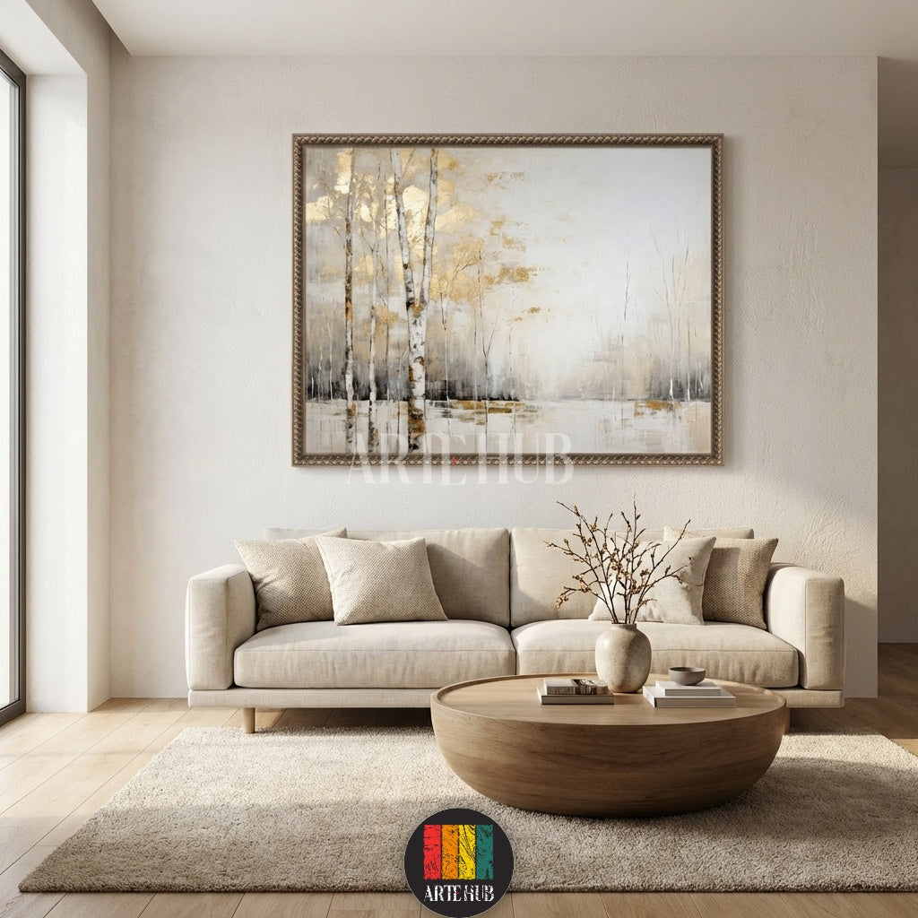 A large square canvas wall art featuring abstract birch trees with gold leaf accents hanging above a modern bed in a neutral-toned bedroom in Egypt by Artehub.

تابلوه كانفاس كبير يصور أشجار البتولا بلمسات ذهبية معلقة فوق سرير عصري في غرفة نوم مصرية بتصميم نيوترال من Artehub مصر.