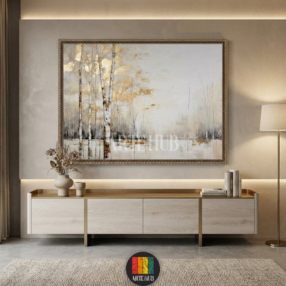 A large square canvas wall art featuring abstract birch trees with gold leaf accents hanging above a modern bed in a neutral-toned bedroom in Egypt by Artehub.

تابلوه كانفاس كبير يصور أشجار البتولا بلمسات ذهبية معلقة فوق سرير عصري في غرفة نوم مصرية بتصميم نيوترال من Artehub مصر.