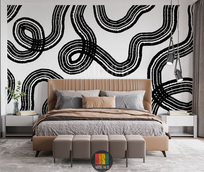 Detailed view of a modern dining room in Egypt featuring a striking black and white abstract line art wallpaper, rattan pendant lights, and wooden furniture with cane accents, creating a contemporary Egyptian aesthetic.
صورة مفصلة لغرفة طعام عصرية في مصر، تظهر ورق حائط فني بخطوط تجريدية سوداء وبيضاء، مع إضاءة خوص وأثاث خشبي أنيق، مما يضفي لمسة ديكور حديثة لمنزلك في مصر.