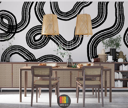 Detailed view of a modern dining room in Egypt featuring a striking black and white abstract line art wallpaper, rattan pendant lights, and wooden furniture with cane accents, creating a contemporary Egyptian aesthetic.
صورة مفصلة لغرفة طعام عصرية في مصر، تظهر ورق حائط فني بخطوط تجريدية سوداء وبيضاء، مع إضاءة خوص وأثاث خشبي أنيق، مما يضفي لمسة ديكور حديثة لمنزلك في مصر.