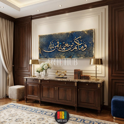 Large horizontal canvas with gold Arabic calligraphy 'And whatever you have of favor is from Allah' on a blue marble background, perfect for Egyptian style interiors by Artehub.

 لوحة فنية كبيرة بخط عربي ذهبي 'وما بكم من نعمة فمن الله' على خلفية زرقاء رخامية، مناسبة للديكور المصري الكلاسيكي والحديث من آرت هوب Artehub مصر.