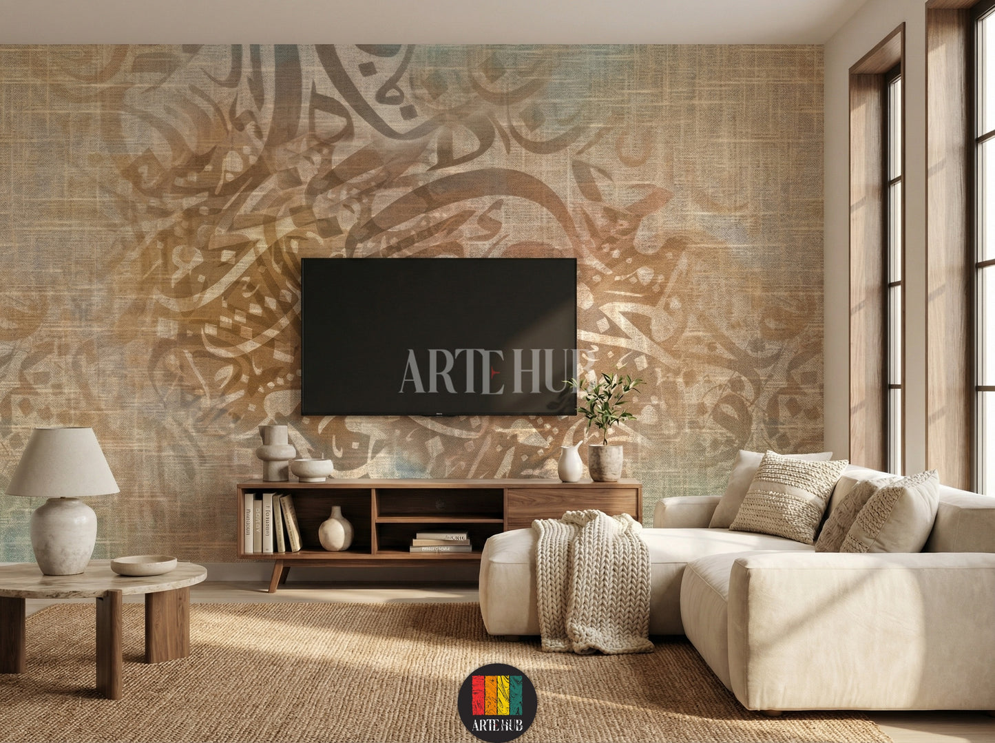 Full shot of a contemporary tv room featuring a custom Arabic calligraphy wallpaper with a burlap-like texture. The warm, abstract design enhances the elegant Egyptian decor. Includes a bed, bedside tables, and hanging lamps.
صورة كاملة لغرفة عصرية مزينة بورق حائط بتصميم خط عربي مميز على خلفية نسيجية. يضيف التصميم الدافئ والأنيق لمسة ديكور مصرية راقية. تظهر السرير والطاولات الجانبية والإضاءة المعلقة.
room: tv room
