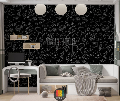 A modern living room features a striking black wallpaper covered in white doodle art, including various arrows, speech bubbles, stars, and clouds. A light grey sofa with blue, grey, and white cushions, a black and white houndstooth throw, a yellow armchair, and wooden tables with decor items are visible. The floor has a textured white rug, creating a vibrant yet sophisticated space.
غرفة معيشة عصرية تتميز بورق حائط أسود لافت للنظر، مزين برسومات شخبطة بيضاء تشمل أسهمًا متنوعة، فقاعات كلام، نجوم، وغيوم. تظهر 