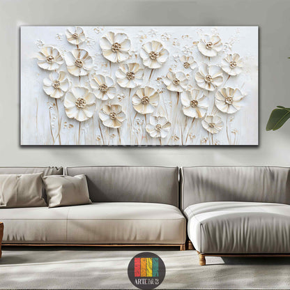 Large white 3D floral canvas wall art with textured petals, displayed above a wooden sideboard in a modern, elegant dining room in Egypt. Features a long oval dining table, beige chairs, and a crystal chandelier, creating a luxurious Egyptian home interior.
تابلوه كبير من القماش بنقوش ورد ثلاثية الأبعاد باللون الأبيض، معروض فوق بوفيه خشبي في غرفة طعام عصرية وأنيقة في مصر. يظهر في الصورة طاولة طعام بيضاوية طويلة وكراسي باللون البيج وثريا كريستالية، مما يخلق تصميماً داخلياً فاخراً للمنزل في مصر.