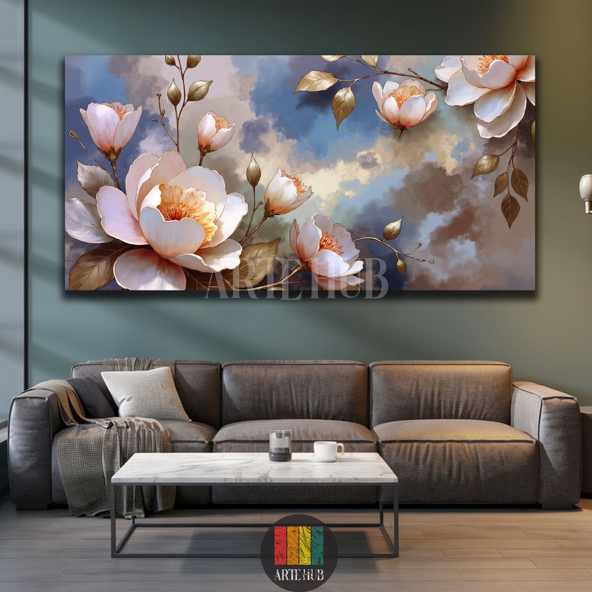 A large horizontal canvas print featuring elegant white and pink blossom flowers with golden leaves against a cloudy blue and beige abstract background, displayed above a wooden console table in a modern Egyptian living room setting.
تابلوه كانفاس أفقي كبير يصور زهور بيضاء ووردية أنيقة مع أوراق ذهبية على خلفية سماء زرقاء وبيج غائمة، معروض فوق طاولة كونسول خشبية في غرفة معيشة عصرية في مصر.