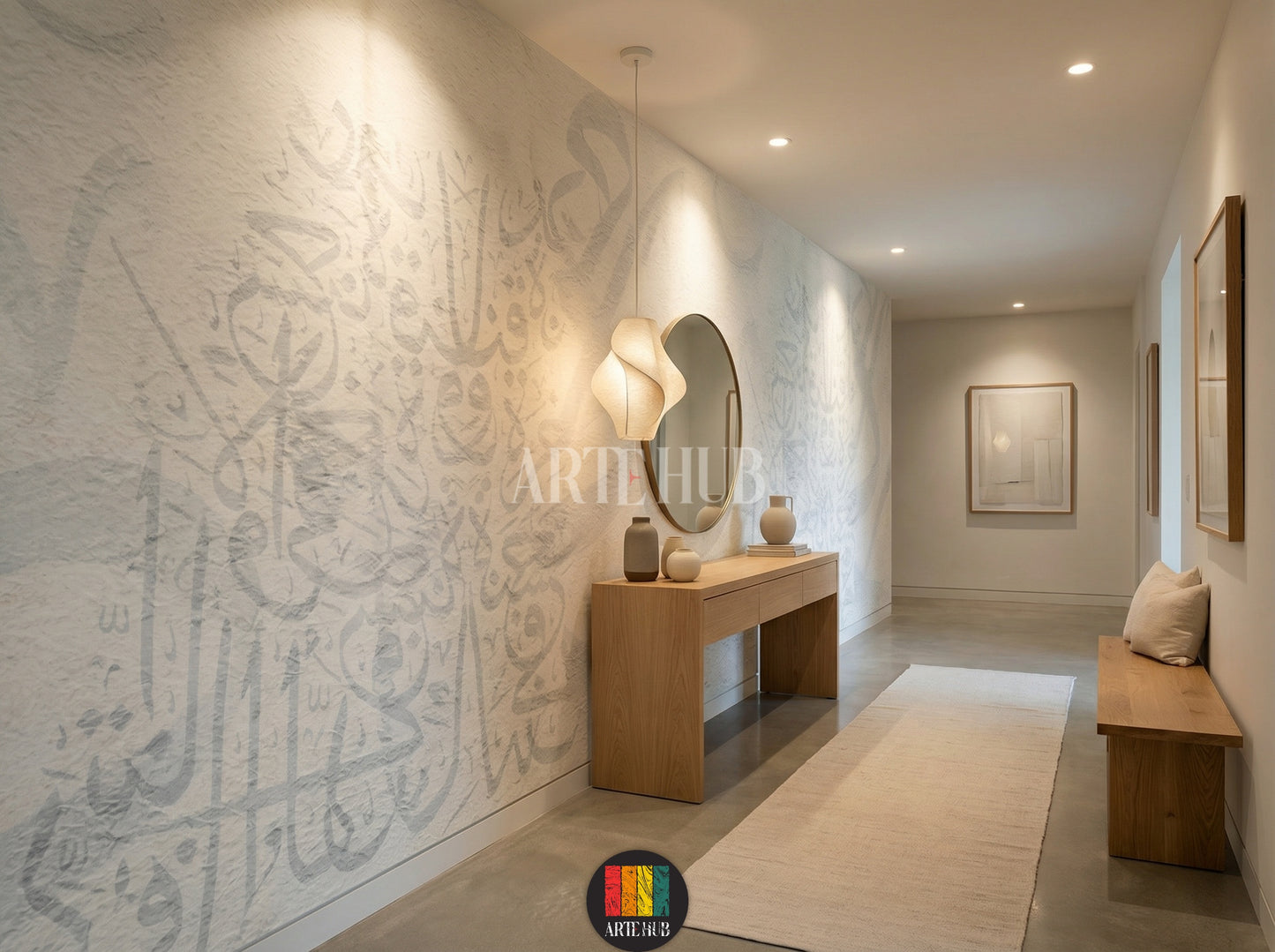 Full view of a modern hallway featuring light, textured wallpaper with subtle Khatt Arabic calligraphy patterns. The room includes a wooden dining table, cream boucle chairs, a light rug, a unique pendant lamp, and a minimalist side cabinet with vases, enhancing contemporary home decor in Egypt.
صورة كاملة لغرفة عصرية تتميز بورق حائط ذو ملمس خفيف ونقوش خط عربي رقيقة. تحتوي الغرفة على طاولة طعام خشبية، كراسي قماش باللون الكريمي، سجادة فاتحة 
room: hallway