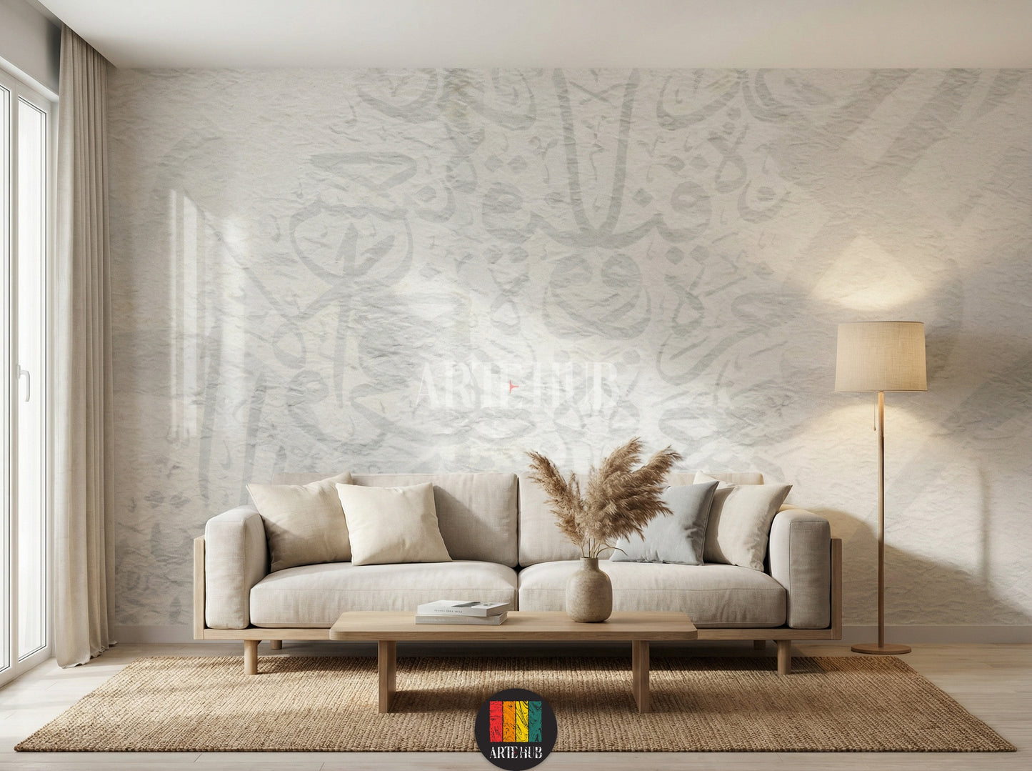 Full view of a modern living room featuring light, textured wallpaper with subtle Khatt Arabic calligraphy patterns. The room includes a wooden dining table, cream boucle chairs, a light rug, a unique pendant lamp, and a minimalist side cabinet with vases, enhancing contemporary home decor in Egypt.
صورة كاملة لغرفة معيشة عصرية تتميز بورق حائط ذو ملمس خفيف ونقوش خط عربي رقيقة. تحتوي الغرفة على طاولة طعام خشبية، كراسي قماش باللون الكريمي، سجادة فاتحة 
room: living room