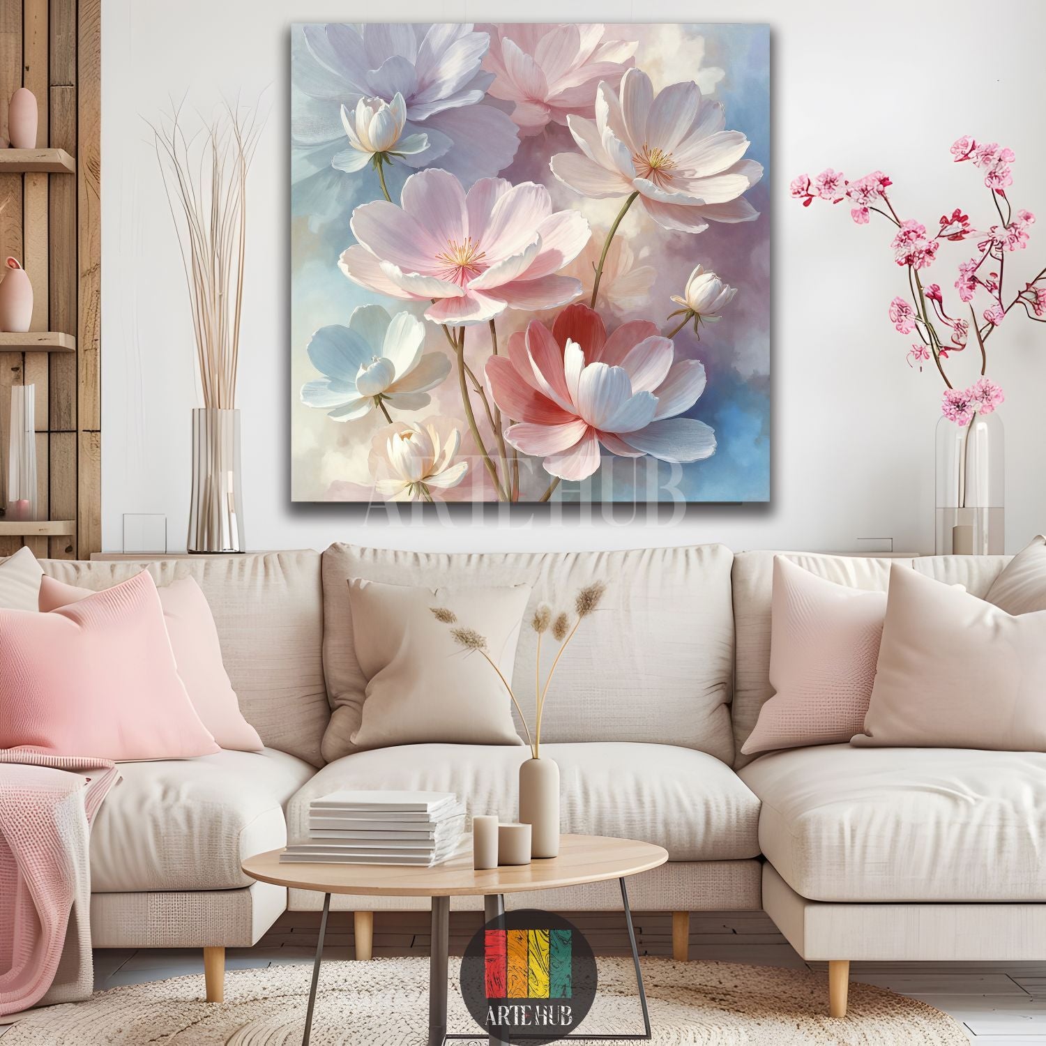A large square canvas print featuring soft pink and white flowers with a dreamy pastel background of blues and purples. The artwork is displayed above a light-colored sectional sofa with pink cushions in a modern living room setting. Perfect for contemporary Egyptian home decor, adding a touch of natural elegance.
تابلوه كانفس مربع كبير يصور زهوراً ناعمة باللون الوردي والأبيض مع خلفية باستيل حالمة من درجات الأزرق والبنفسجي. اللوحة معلقة فوق أريكة عصرية ذات لون فاتح مع وسائد وردية في غرفة معيشة أنيقة. مثالي 