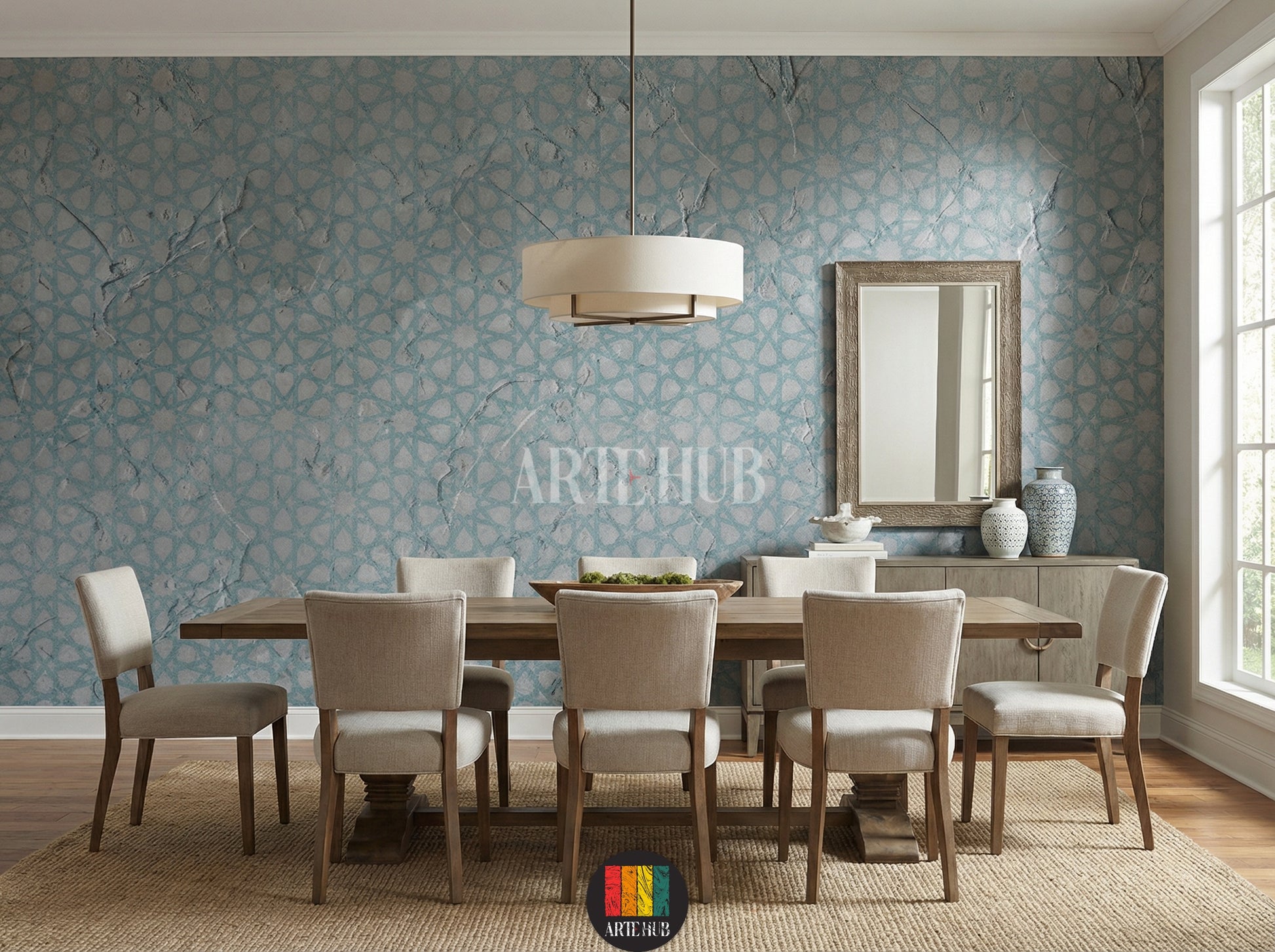 Full view of a modern dining room featuring a light blue and grey geometric textured wallpaper with an Islamic pattern. A white sofa with grey pillows, a white coffee table with candles and decor, and modern black pendant lights are visible. Ideal for contemporary home decor in Egypt.
صورة كاملة لغرفة طعام عصرية بها ورق حائط مزخرف بنقوش هندسية إسلامية باللون الأزرق الفاتح والرمادي. تظهر كنبة بيضاء بوسائد رمادية، طاولة قهوة بيضاء مع شموع وديكور، وإضاءة معلقة حديثة. 
room: dining room