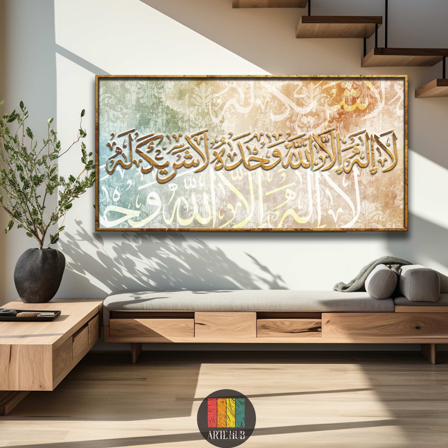 Large framed canvas featuring golden 3D Islamic calligraphy of 'La ilaha illallah وحده لا شريك له' against a textured teal and beige background, displayed in a modern Egyptian living room above a wooden console table with decor. Ideal for Islamic wall art in Egypt.
تابلوه كانفاس كبير مؤطر يظهر خط عربي إسلامي ذهبي بارز 'لا إله إلا الله وحده لا شريك له' على خلفية مزخرفة باللونين الأزرق المخضر والبيج. معروض في غرفة معيشة عصرية مصرية فوق طاولة خشبية. مثالي لديكورات الحائط الإسلامية في مصر.