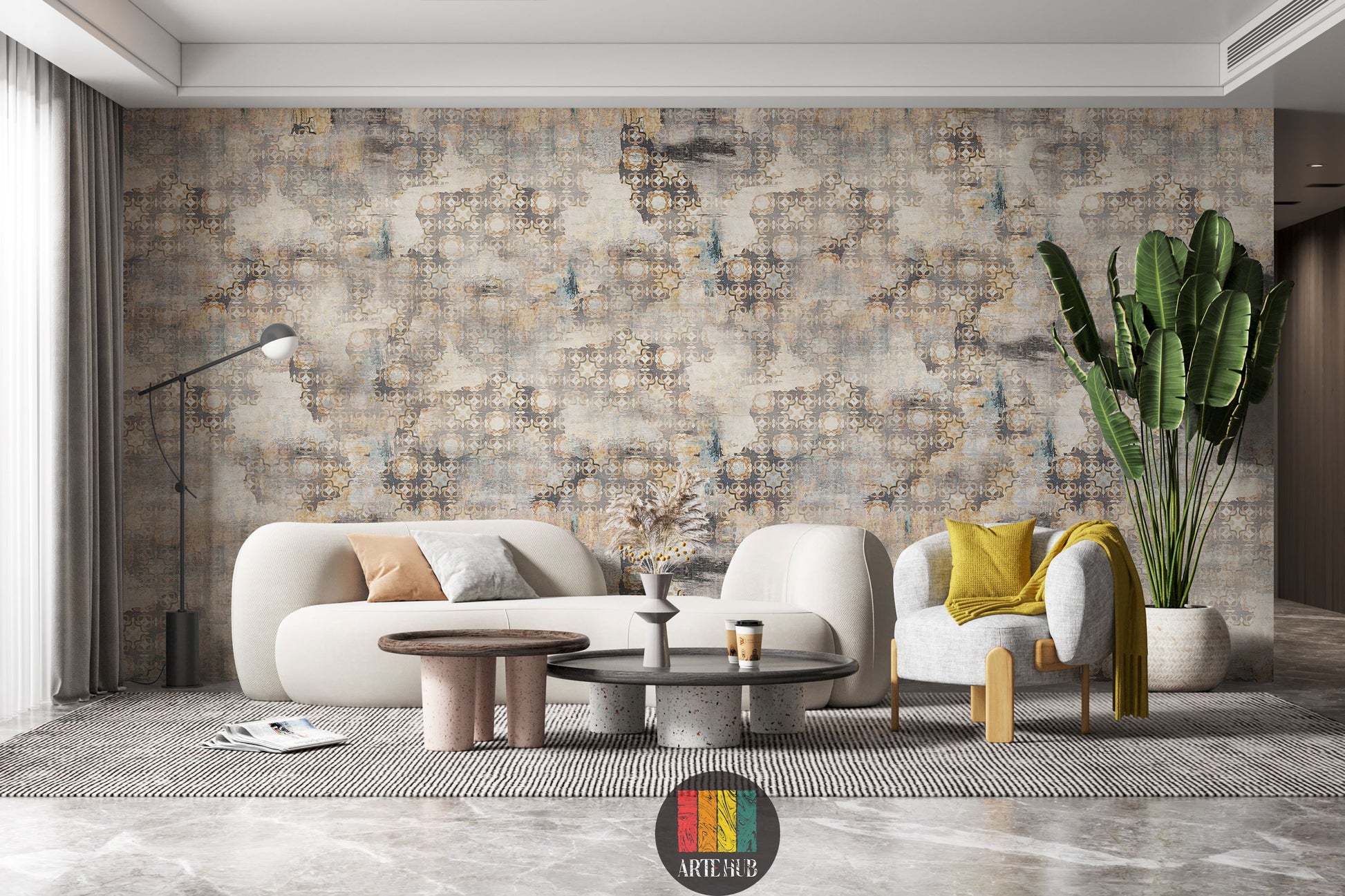 Full view of a living room featuring the Heritage geometric abstract wallpaper in earthy tones, with a modern white sofa, grey armchair, coffee tables, and a large plant. Ideal wall decor for an Egyptian contemporary living space.
منظر كامل لغرفة معيشة مزينة بورق حائط Heritage بنمط هندسي مجرد وألوان ترابية، مع كنبة بيضاء حديثة وكرسي بذراعين رمادي وطاولات قهوة ونبات كبير. ديكور حائط مثالي للمنازل العصرية في مصر.
room: living room