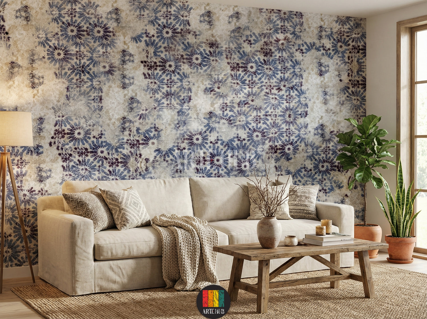 Full shot of a living room with a feature wall adorned with Indigo Floral Wallpaper, showcasing a unique blue and purple abstract floral pattern on a textured light background, perfect for a modern Egyptian home. A beige sofa, wooden coffee table, and indoor plants are visible.
صورة لغرفة معيشة حديثة تتميز بورق حائط إنديغو فلورال بنمط زهور تجريدي باللونين الأزرق والبنفسجي على خلفية فاتحة، مثالية لديكورات المنازل العصرية في مصر. تظهر كنبة بيج وطاولة قهوة خشبية ونباتات منزلية.
room: living room