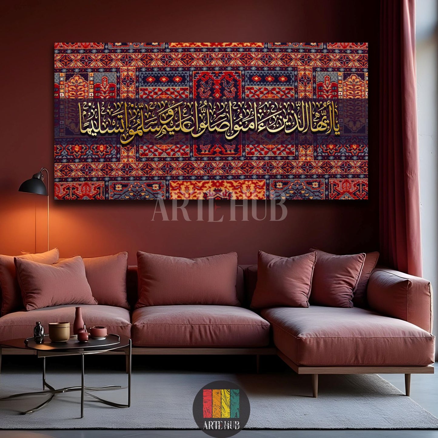 A large, rectangular canvas featuring golden Islamic calligraphy on a rich, patterned background resembling a traditional rug, displayed above a salmon-colored L-shaped sofa in a modern Egyptian living room. Enhances elegant home decor in Egypt.
تابلوه كبير مستطيل بخط عربي إسلامي ذهبي على خلفية غنية بنقوش تشبه السجاد الشرقي، معروض فوق كنبة عصرية بلون السلمون في غرفة معيشة مصرية. ديكور منزلي راقي لمصر.