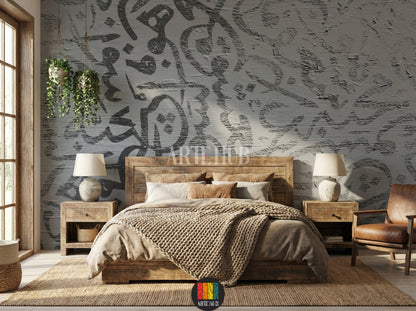 Full view of a luxurious dining room featuring abstract Arabic calligraphy wallpaper in muted tones. The room includes a dark wood dining table, emerald green velvet chairs with geometric patterns, a gold chandelier, and wall sconces. A decorative mirror and buffet cabinet complete the elegant Egyptian interior design.
صورة كاملة لغرفة طعام فاخرة بورق حائط بتصميم الخط العربي التجريدي بألوان هادئة. تتضمن الغرفة طاولة طعام خشبية داكنة، وكراسي مخملية خضراء زمردية بنقوش .
room: bedroom
