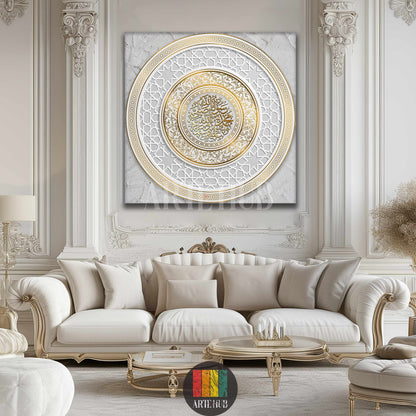 A large square canvas featuring intricate golden Islamic calligraphy of 'Muhammad Rasul Allah' within a circular geometric pattern, displayed above a luxurious cream sofa in a neoclassical Egyptian living room.
تابلوه كانفس مربع كبير بتصميم فن إسلامي فاخر بخط عربي 'محمد رسول الله' ونقوش هندسية ذهبية، معروض فوق كنبة كريمة فخمة في غرفة معيشة عصرية في مصر.