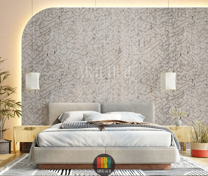 Detailed view of a modern bedroom wall adorned with light beige textured wallpaper featuring abstract Arabic calligraphy. A stylish grey sofa, a white marble coffee table, and a grey side table complete the contemporary Egyptian interior decor.
منظر تفصيلي لجدار غرفة نوم عصرية مزين بورق حائط بيج فاتح بنقوش خط عربي تجريدي. تظهر كنبة رمادية أنيقة وطاولة قهوة رخامية بيضاء وطاولة جانبية رمادية لتكمل الديكور الداخلي العصري في مصر.
room: bedroom