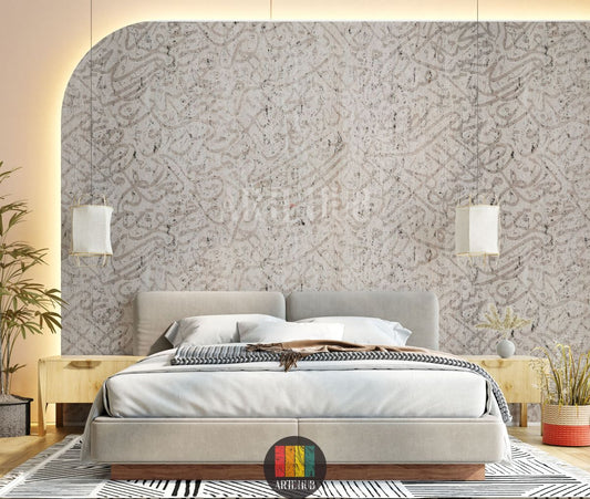 Detailed view of a modern bedroom wall adorned with light beige textured wallpaper featuring abstract Arabic calligraphy. A stylish grey sofa, a white marble coffee table, and a grey side table complete the contemporary Egyptian interior decor.
منظر تفصيلي لجدار غرفة نوم عصرية مزين بورق حائط بيج فاتح بنقوش خط عربي تجريدي. تظهر كنبة رمادية أنيقة وطاولة قهوة رخامية بيضاء وطاولة جانبية رمادية لتكمل الديكور الداخلي العصري في مصر.
room: bedroom