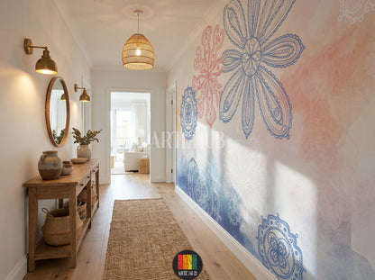A cozy halway features a large decorative wallpaper with blue and pink mandala-style floral patterns and watercolor washes. A wooden dining table is set with ceramics, surrounded by blue and beige chairs. A woven pendant light hangs above. Ideal for contemporary home decor in Egypt.
ممر مع ورق حائط مزخرف بنقوش ماندالا زهرية باللونين الأزرق والوردي، وخلفية مائية. طاولة طعام خشبية مجهزة بأطباق خزفية وكراسي باللونين الأزرق والبيج. إضاءة معلقة من الخيزران. 
room: hallway
