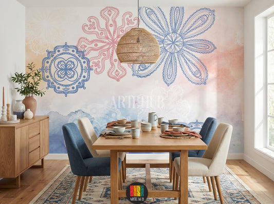 A cozy dining room features a large decorative wallpaper with blue and pink mandala-style floral patterns and watercolor washes. A wooden dining table is set with ceramics, surrounded by blue and beige chairs. A woven pendant light hangs above. Ideal for contemporary home decor in Egypt.
غرفة طعام دافئة مع ورق حائط مزخرف بنقوش ماندالا زهرية باللونين الأزرق والوردي، وخلفية مائية. طاولة طعام خشبية مجهزة بأطباق خزفية وكراسي باللونين الأزرق والبيج. إضاءة معلقة من الخيزران. 
room: dining room