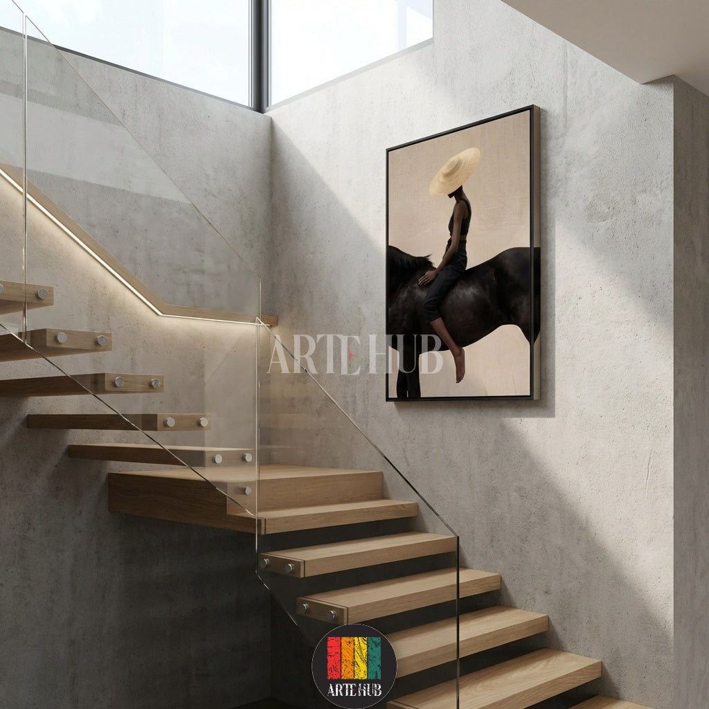  A minimalist modern canvas from Artehub featuring a woman in a straw hat riding a black horse, perfect for wall art in Egypt and contemporary home decor.

 تابلوه كانفاس مودرن من Artehub يصور امرأة ترتدي قبعة تركب حصاناً أسود، مثالي لديكور الحائط في مصر ولمحبي الخيل.
