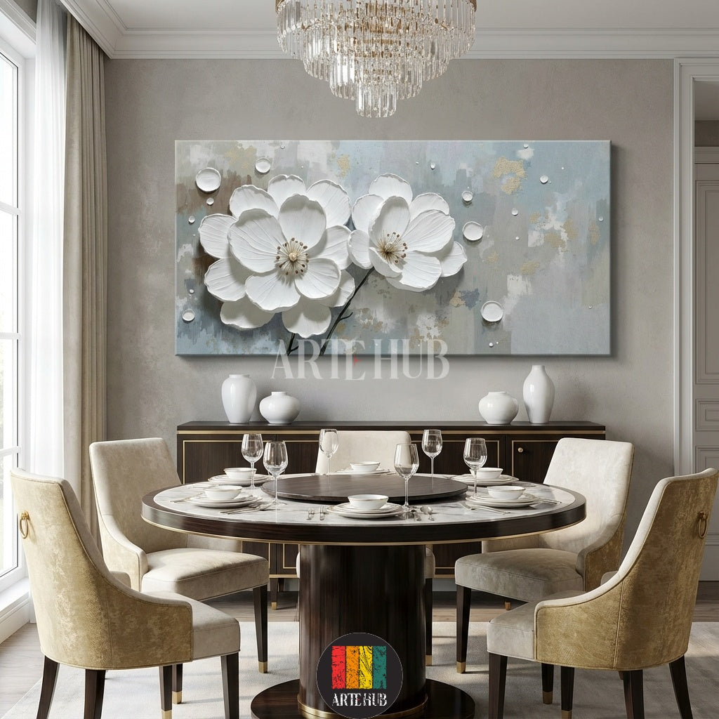 A large rectangular canvas wall art by Artehub featuring two 3D textured white blossoms on a minimalist grey and gold background, styled for an elegant living room in Egypt.

لوحة كانفاس كبيرة من Artehub تضم زهوراً بيضاء بارزة بتصميم ثلاثي الأبعاد على خلفية رمادية وذهبية، مناسبة لديكورات المنازل الفاخرة في مصر.