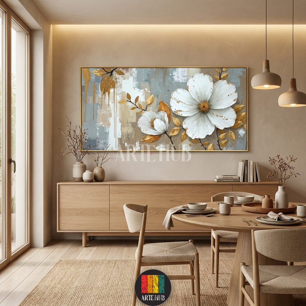 A large horizontal canvas featuring two large white blooming flowers with golden leaf accents on an abstract grey and beige background, styled as elegant wall art for an Egyptian home by Artehub.

 لوحة كانفاس كبيرة الحجم تضم زهور بيضاء متفتحة مع لمسات من أوراق الشجر الذهبية على خلفية تجريدية، تابلوه مودرن راقي لغرف المعيشة في مصر من Artehub.