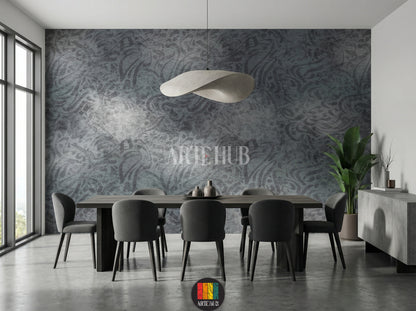 Detailed view of a modern dining room featuring a dark grey abstract patterned wallpaper. The room includes a large dark wood dining table, grey upholstered chairs, a unique white pendant light, and a tall green plant, enhancing the contemporary Egyptian decor.
صورة مفصلة لغرفة طعام عصرية تعرض ورق حائط رمادي داكن بنقوش تجريدية. الغرفة تحتوي على طاولة طعام خشبية داكنة كبيرة، كراسي قماش رمادية، إضاءة معلقة بيضاء فريدة، ونبات أخضر طويل، مما يبرز الديكور العصري في مصر.
room: dining room
