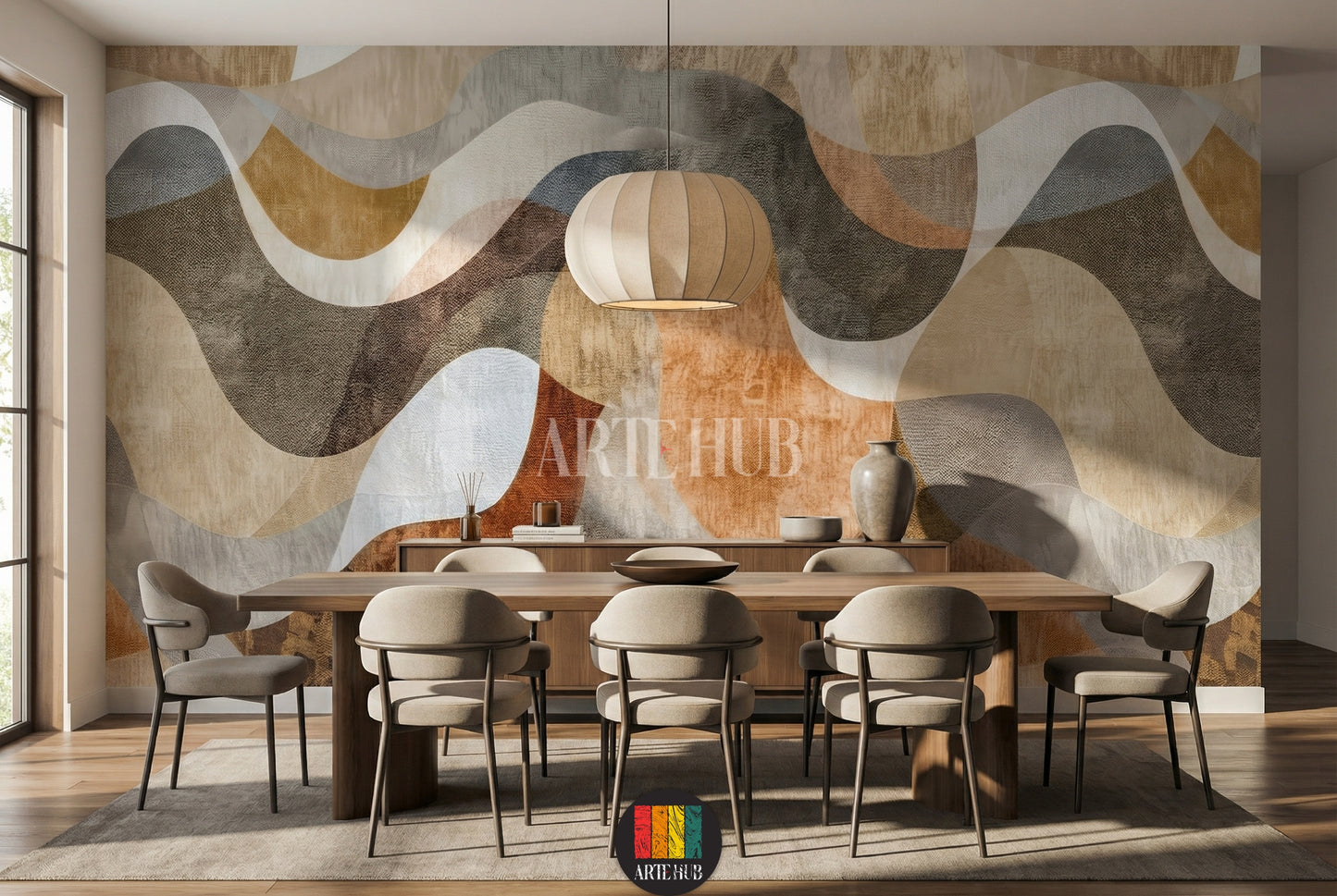 Full view of a modern living room featuring an abstract wavy pattern wallpaper in earthy tones of brown, beige, and grey. A neutral-colored L-shaped sofa with throw blankets and pillows sits against the wall. A dark wood coffee table with decor items, a TV unit, a floor lamp, and two brown leather armchairs are also visible, showcasing contemporary home decor in Egypt.
منظر كامل لغرفة معيشة عصرية تضم ورق حائط بتصميم أمواج تجريدية بألوان ترابية من البني والبيج والرمادي.  L بلون محايد
 room: dining room