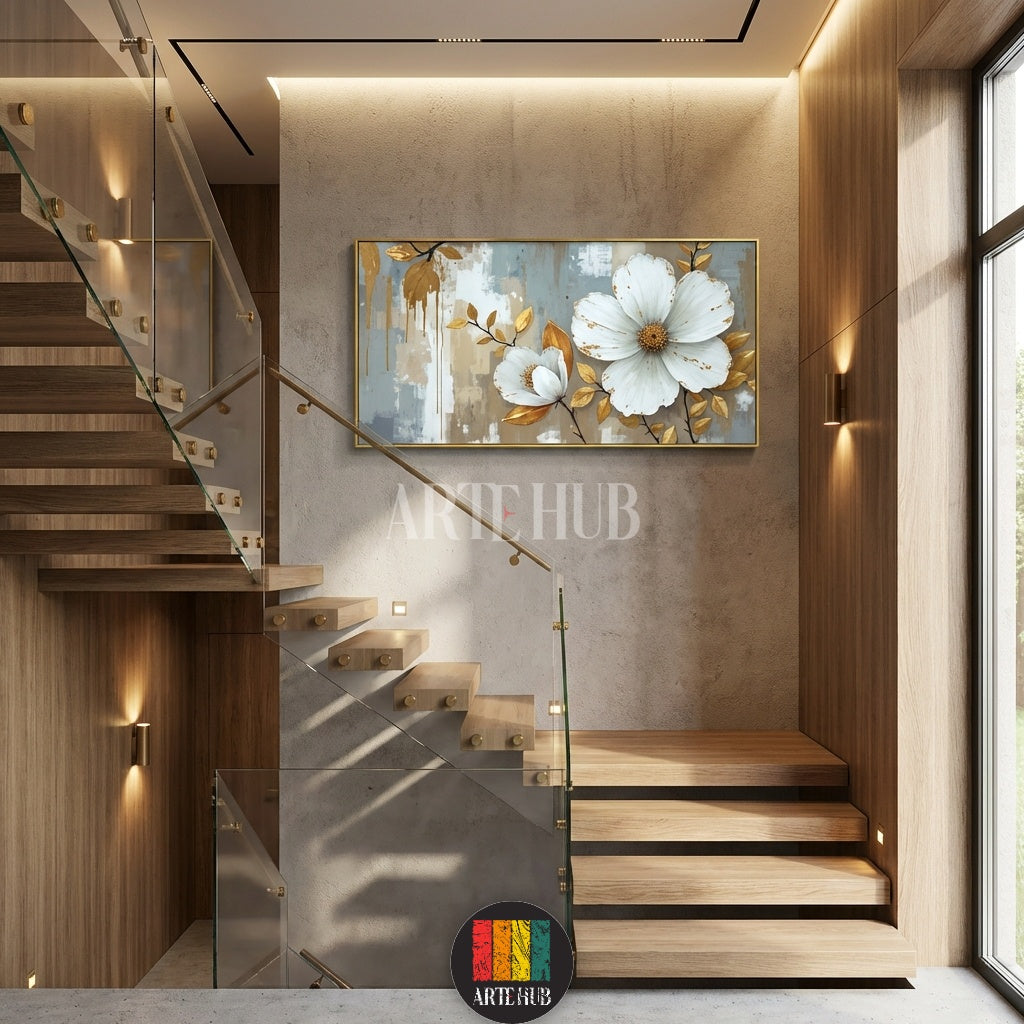  A large horizontal canvas featuring two large white blooming flowers with golden leaf accents on an abstract grey and beige background, styled as elegant wall art for an Egyptian home by Artehub.

 لوحة كانفاس كبيرة الحجم تضم زهور بيضاء متفتحة مع لمسات من أوراق الشجر الذهبية على خلفية تجريدية، تابلوه مودرن راقي لغرف المعيشة في مصر من Artehub.