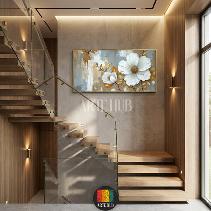  A large horizontal canvas featuring two large white blooming flowers with golden leaf accents on an abstract grey and beige background, styled as elegant wall art for an Egyptian home by Artehub.

 لوحة كانفاس كبيرة الحجم تضم زهور بيضاء متفتحة مع لمسات من أوراق الشجر الذهبية على خلفية تجريدية، تابلوه مودرن راقي لغرف المعيشة في مصر من Artehub.