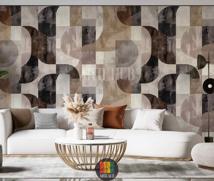 A living room featuring a modern geometric abstract wallpaper with interlocking arcs and squares in earthy tones of brown, beige, grey, and black, enhancing contemporary interior decor in Egypt. A white sofa, gold coffee table, and pampas grass complete the stylish setting.
غرفة معيشة حديثة تتميز بورق حائط بتصميم هندسي تجريدي بأقواس ومربعات متداخلة بألوان ترابية من البني والبيج والرمادي والأسود، 
مما يعزز الديكور الداخلي المعاصر في مصر. 
room: living room