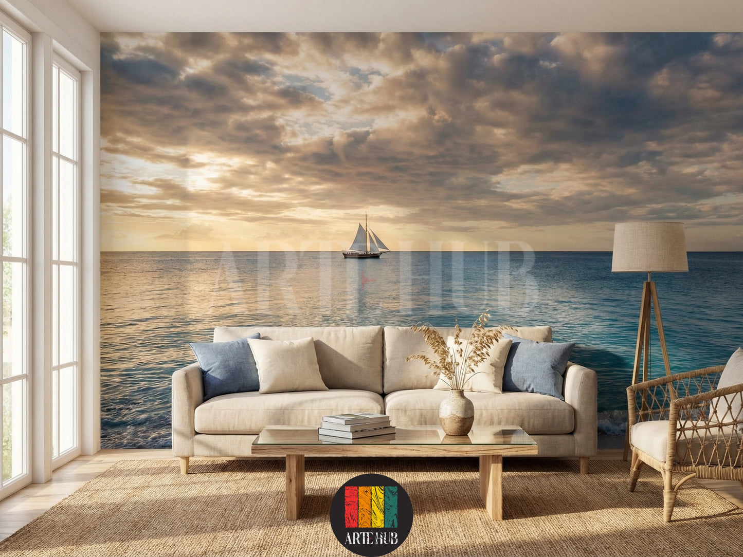 A serene living room featuring a large wall mural canvas print of a sailboat on the calm ocean at sunset under a dramatic cloudy sky, perfect for adding a tranquil touch to any home in Egypt. The room has a beige sofa, blue and cream pillows, a glass coffee table, and a woven rug.
غرفة معيشة هادئة بها تابلوه حائط كبير على كانفاس يصور مركبًا شراعيًا في المحيط الهادئ عند الغروب تحت سماء ملبدة بالغيوم، مثالي لإضفاء لمسة من الهدوء لأي منزل في مصر. الغرفة تحتوي على أريكة بيج ووسائد زرقاء 
room: living room
