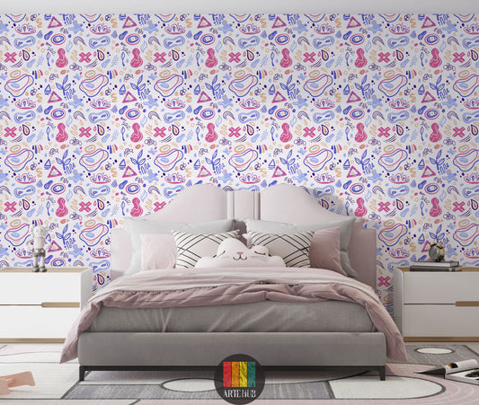 A cozy kids' bedroom featuring a light pink upholstered bed with pillows and white nightstands. The back wall is adorned with a vibrant, whimsical abstract pattern wallpaper in shades of blue, pink, purple, and beige on a white background.
غرفة نوم أطفال مريحة تتميز بسرير وردي فاتح مبطن مع وسائد وطاولات سرير بيضاء. الجدار الخلفي مزين بورق حائط بنقشة تجريدية حيوية ومرحة بألوان الأزرق والوردي والأرجواني والبيج على خلفية بيضاء.