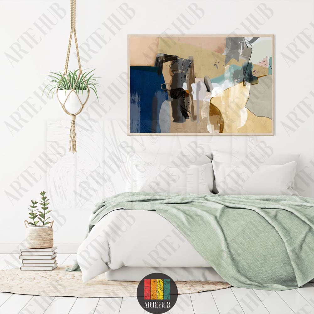 Modern abstract canvas wall art featuring deep blue, ochre, and grey shapes in a light wood frame, perfect for luxury home decor in Egypt.