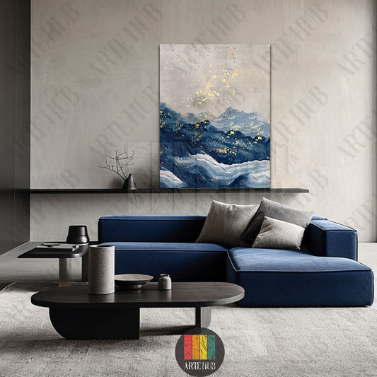 A premium canvas wall art piece with abstract blue waves and gold leaf splatters, ideal for luxury home decor in Egypt.