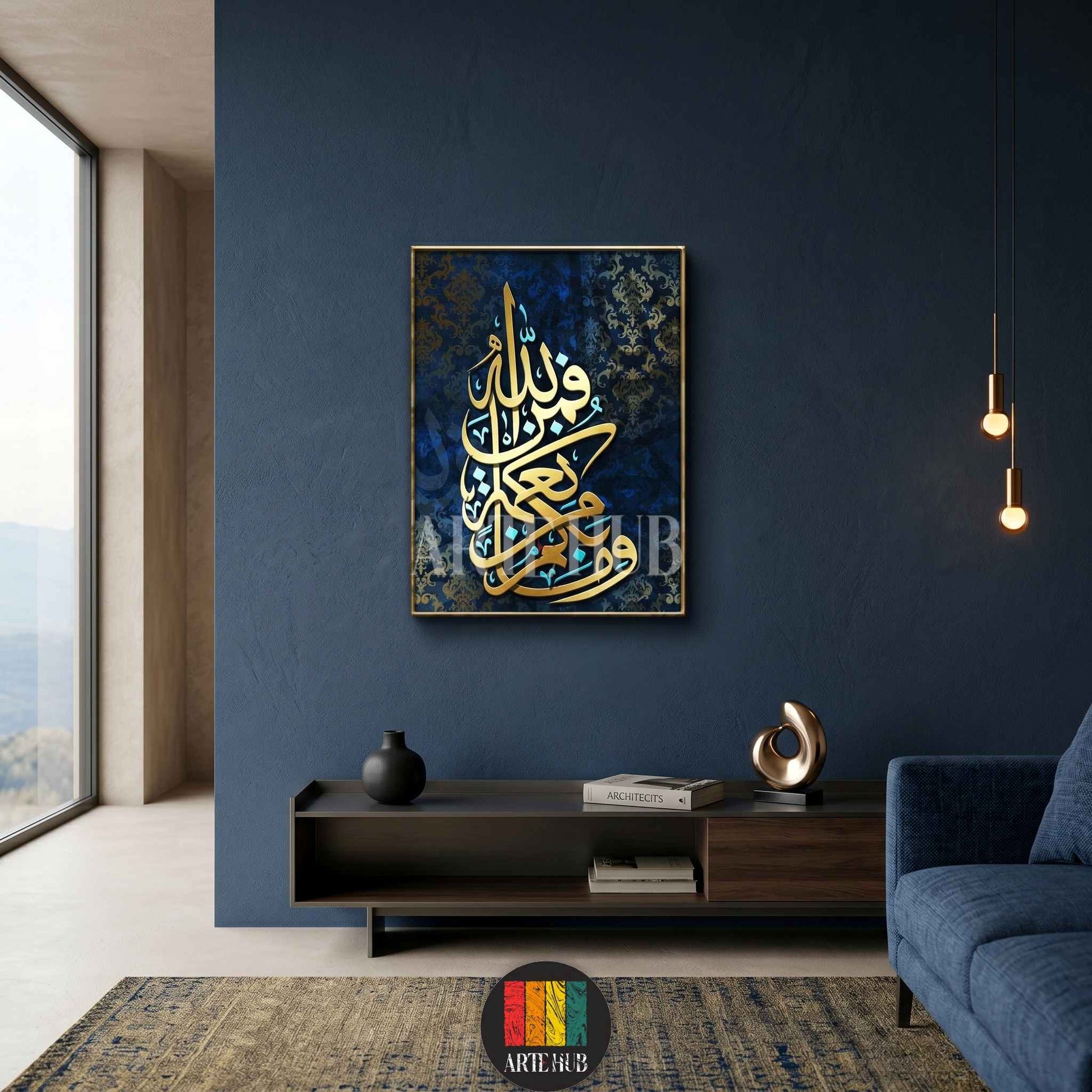 Framed gold Arabic calligraphy canvas wall art featuring religious script on a textured blue pattern background in a modern Egyptian home.