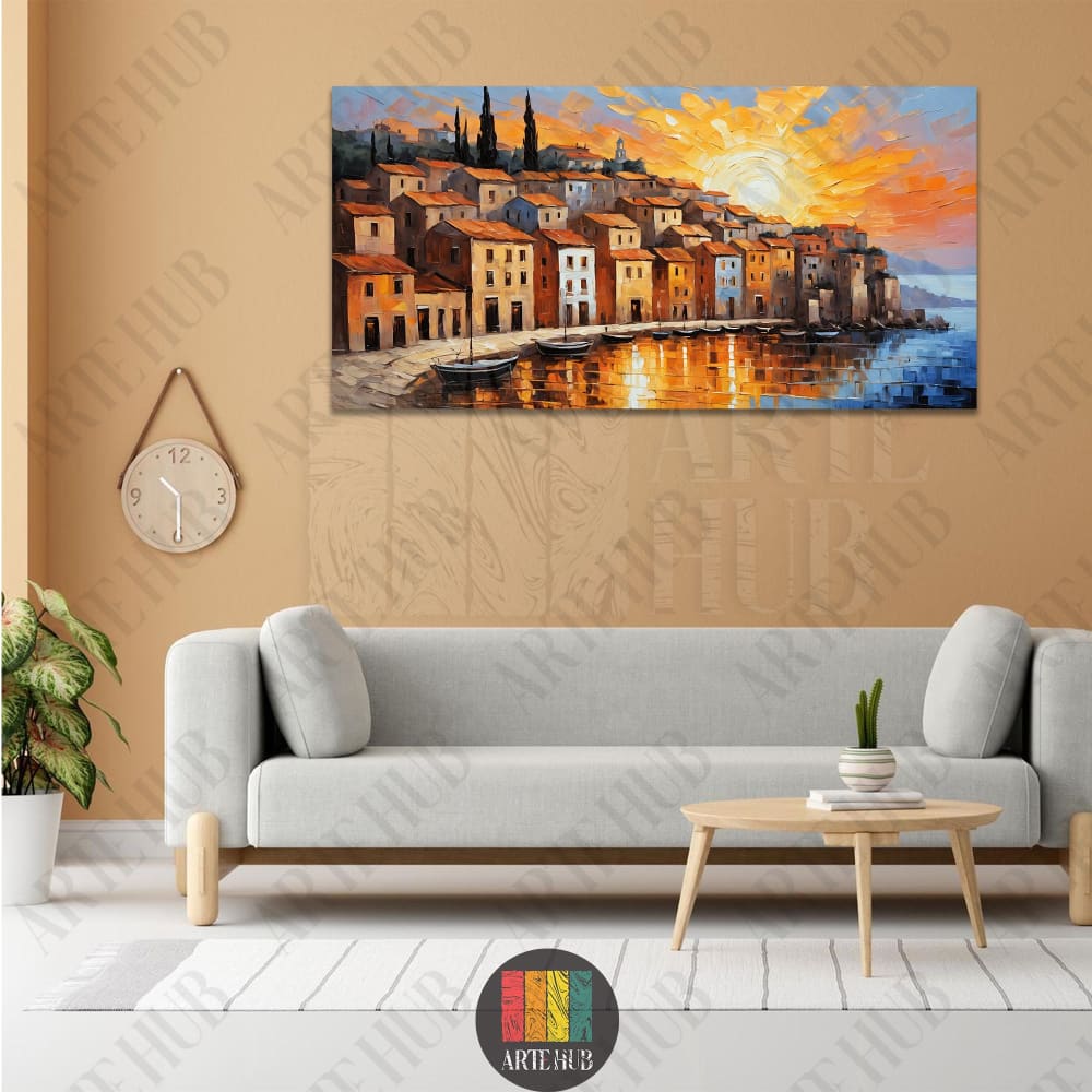 Vibrant impressionist canvas wall art featuring a coastal village harbor at sunset with warm orange and yellow light reflections on blue water.
