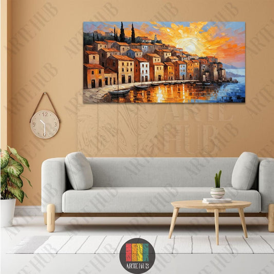 Vibrant impressionist canvas wall art featuring a coastal village harbor at sunset with warm orange and yellow light reflections on blue water.