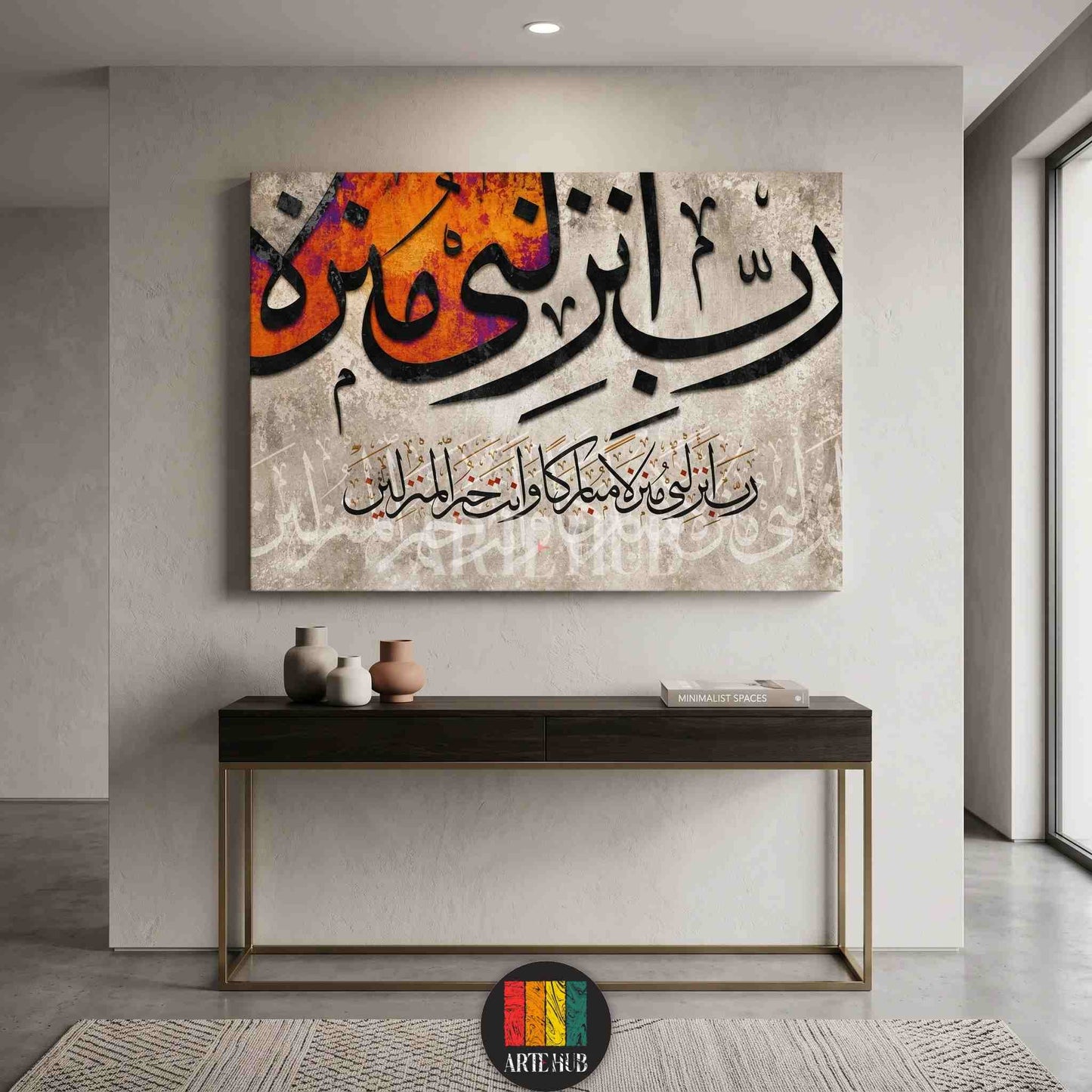 Luxury canvas wall art featuring bold black Arabic calligraphy on a textured abstract background, displayed above a modern console table in an Egyptian home.