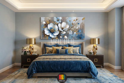 A large horizontal canvas wall art piece featuring elegant blue and white blossoms with gold accents in a luxury modern bedroom interior in Egypt.