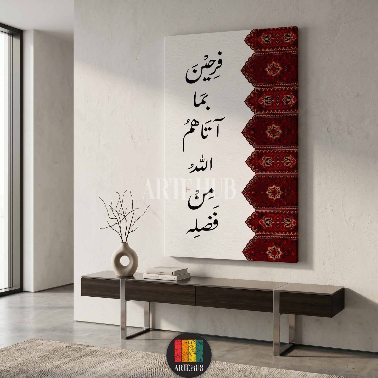 Modern vertical canvas wall art with black Arabic calligraphy and a rich red ornamental carpet border design in a luxury minimalist living room.