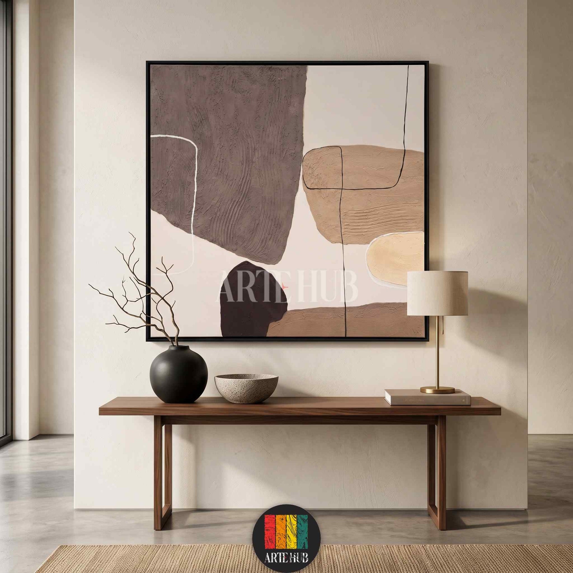 Large textured abstract canvas wall art featuring earthy tones and minimalist shapes in a modern luxury living room setting in Egypt.