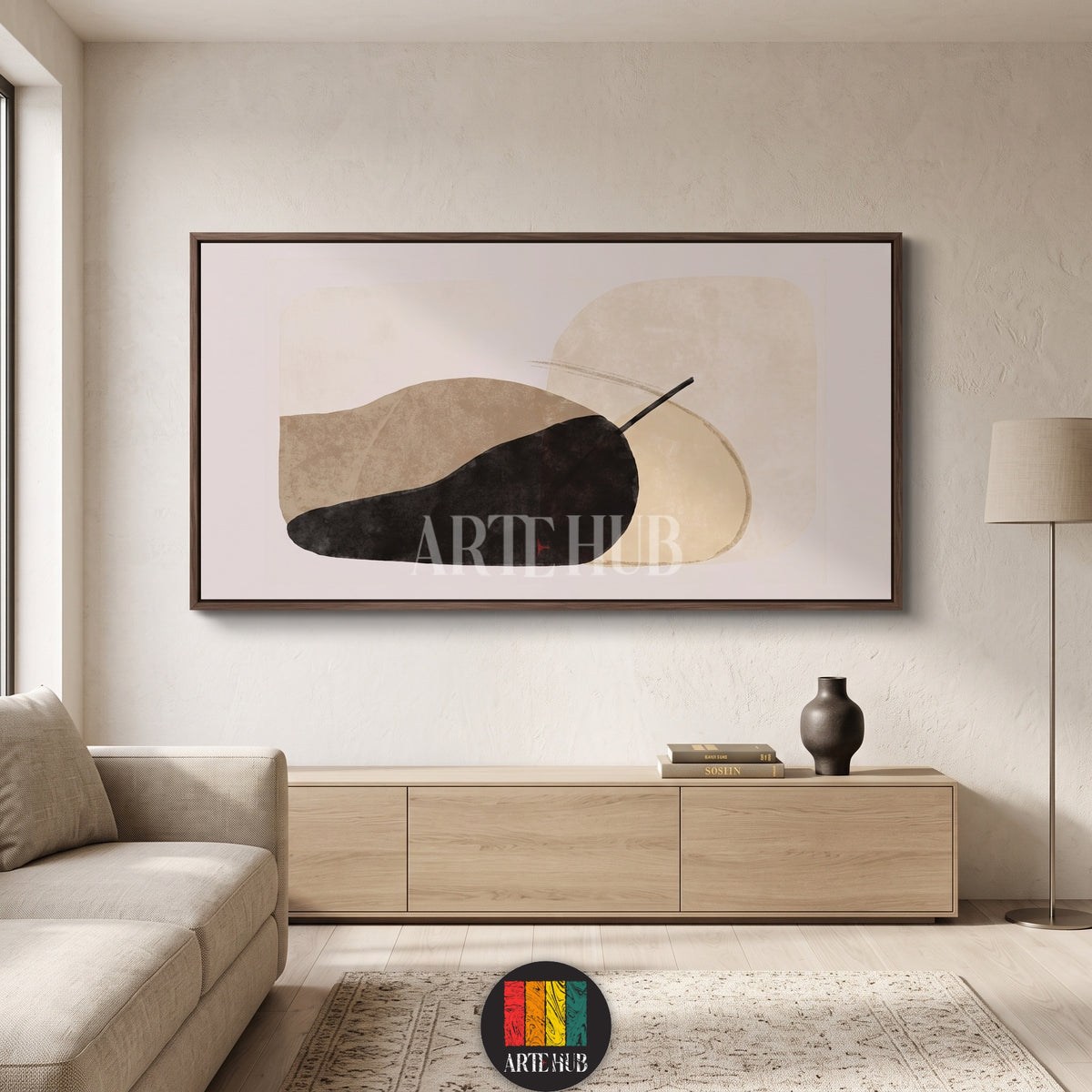 Minimalist abstract canvas wall art with organic shapes in beige and black tones, styled in a luxury Egyptian living room.