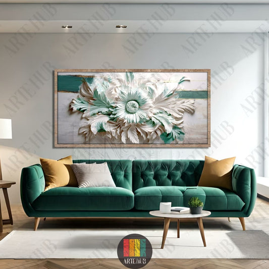 A modern 3D-style floral canvas wall art featuring white acanthus leaves with teal and gold accents, displayed in a wooden frame above a green velvet sofa.