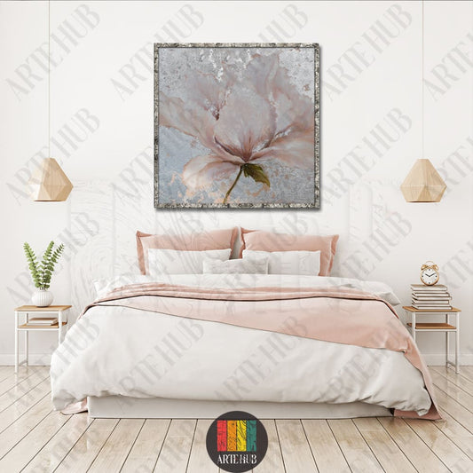Modern floral canvas wall art featuring a large pale pink blossom on a textured silver background, framed for luxury home decor in Egypt.