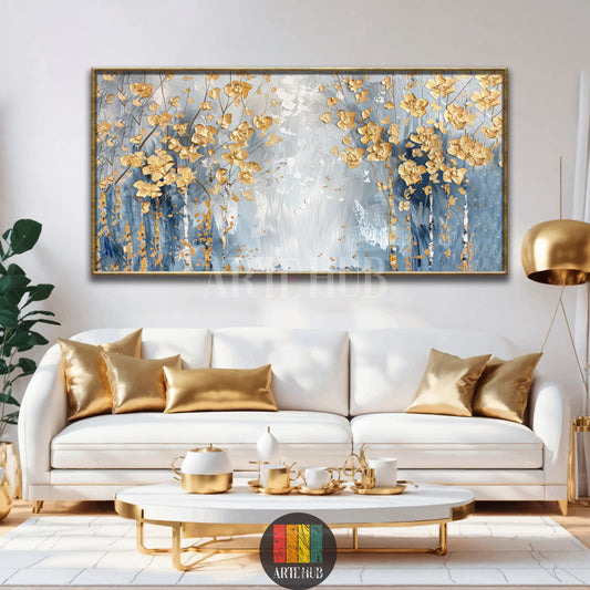Luxurious landscape canvas wall art featuring abstract golden trees on a textured blue and white background with a premium gold frame in a modern setting.