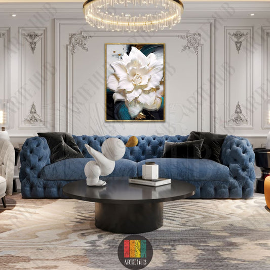 A premium canvas wall art piece showing a detailed white flower with gold splashes, displayed in a luxury living room setting in Egypt.