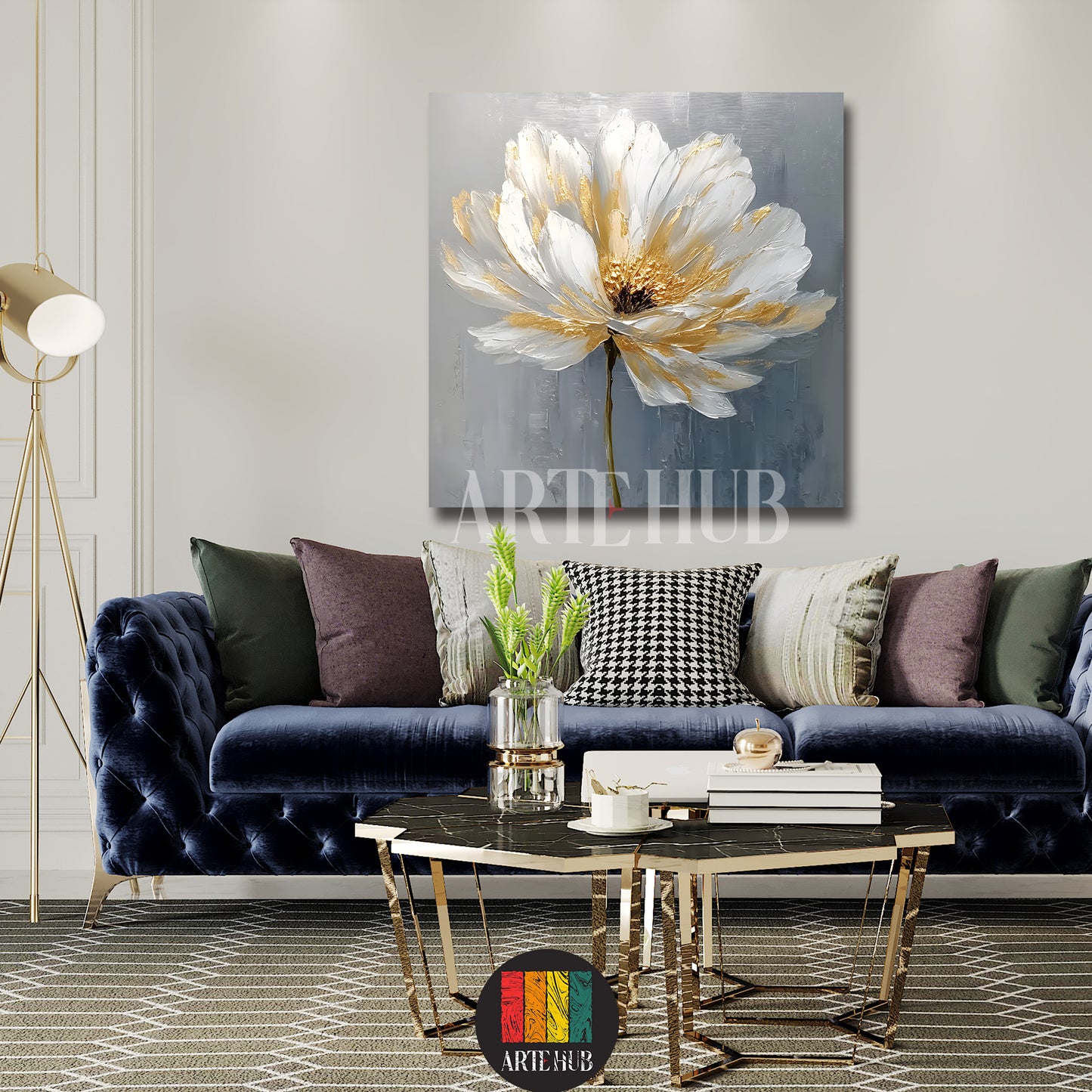 A luxury square canvas wall art piece displaying a stylized white flower with golden highlights on a textured grey background in a modern living room.