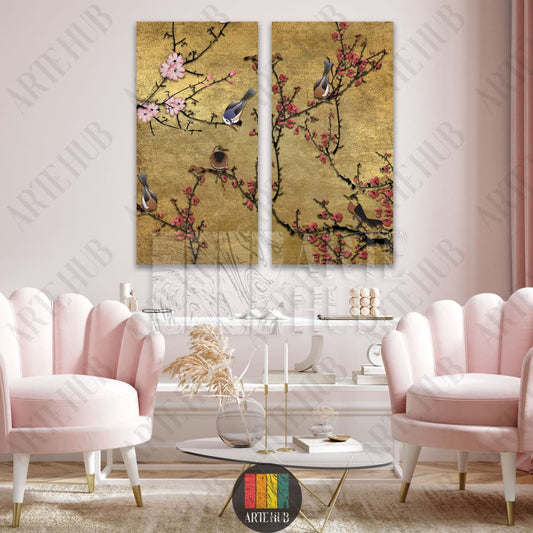 Luxury two-piece canvas wall art depicting birds perched on blossoming branches against a shimmering gold background, styled in a modern Egyptian interior.