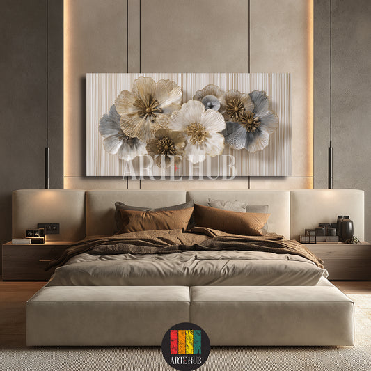 A luxury square canvas wall art piece displaying a stylized white flower with golden highlights on a textured grey background in a modern living room.